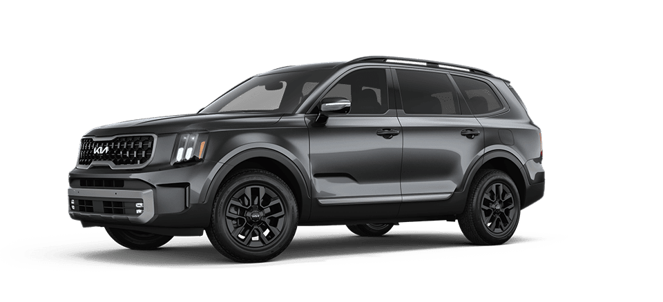 2026 Kia Telluride gray luxury 3-row family SUV side front view with bold grille design| Arabwheels.ae